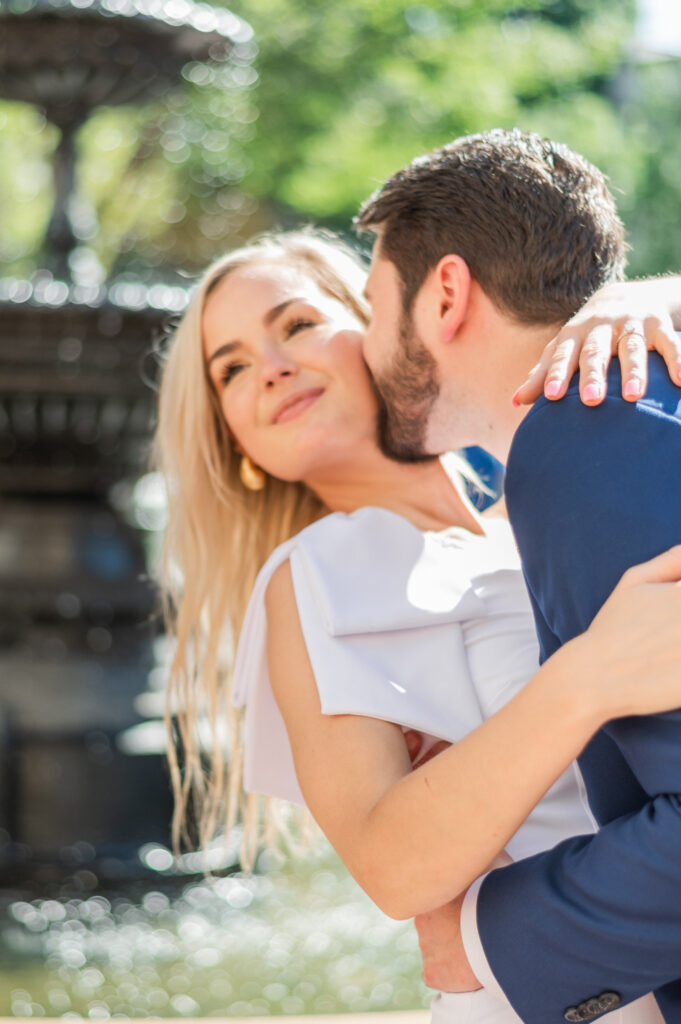 Poinsett Hotel engagement shoot in front of water fountain