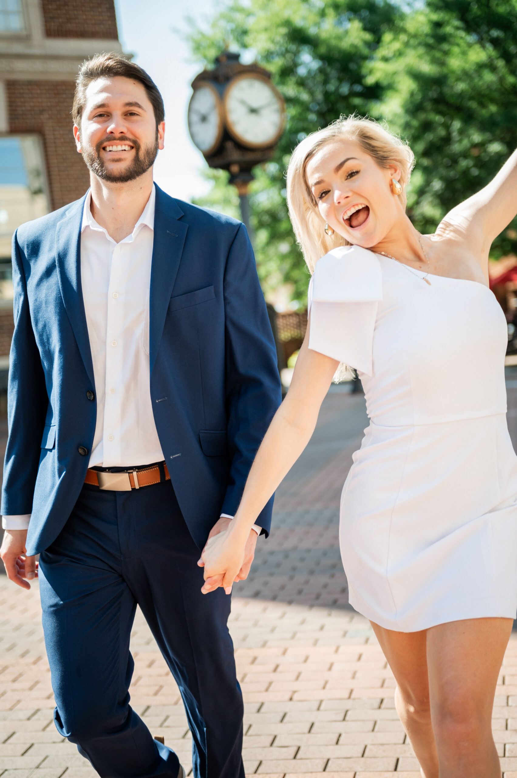 Poinsett Hotel Downtown Greenville SC Couples Photo in front of the iconic clock