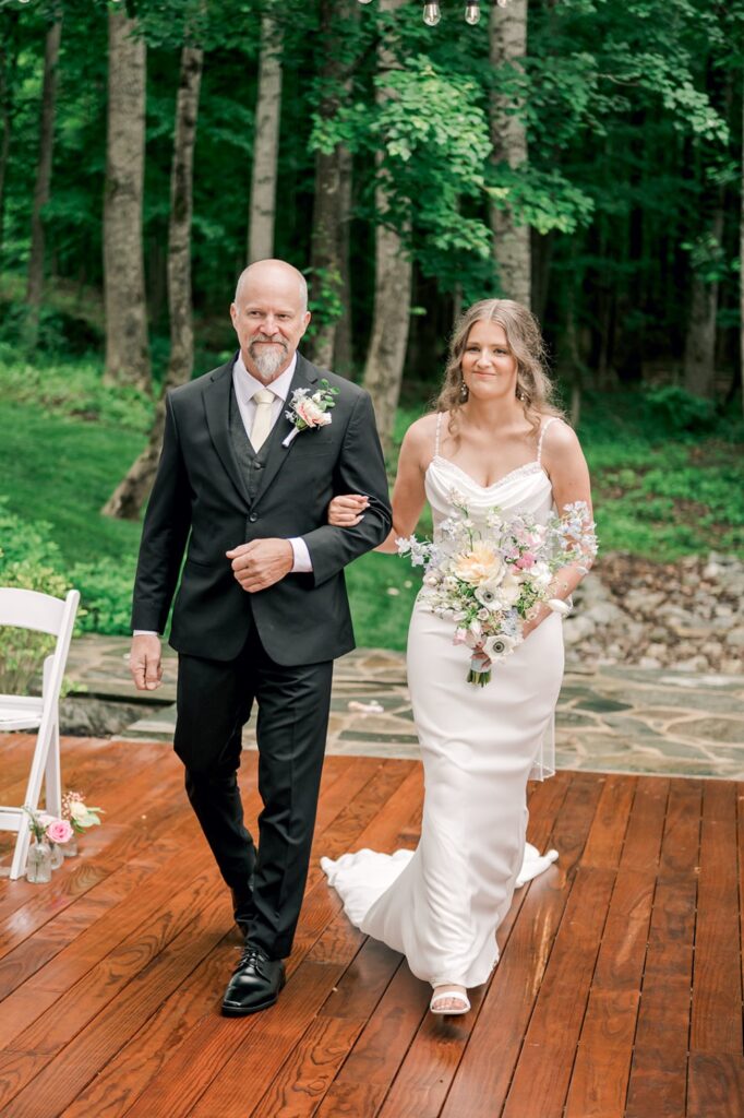 father walks bride down the isle at piney grove ranch wedding
