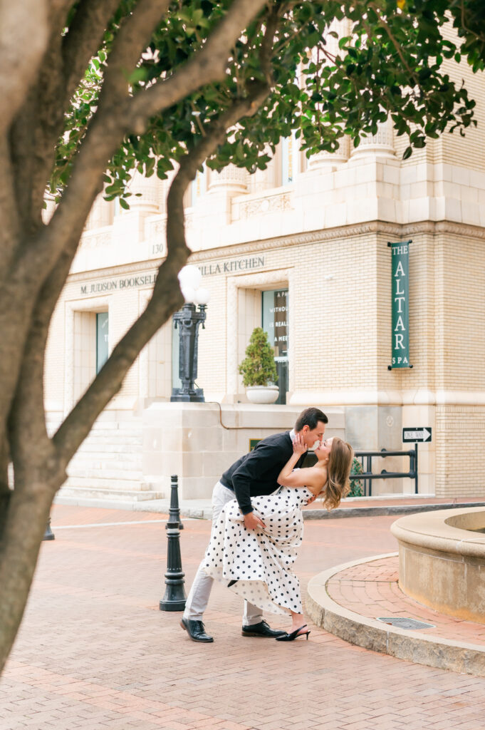 Couple dipping for a kiss outside the Westin Poinsett in Greenville South Carolina