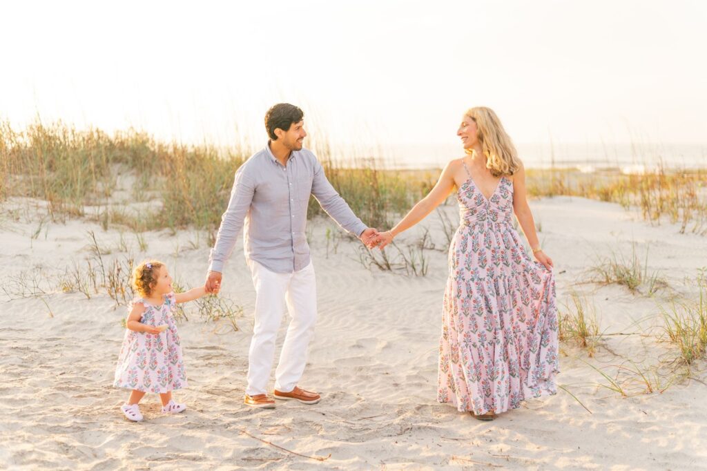 Family walks together at Hilton Head Beach photography session