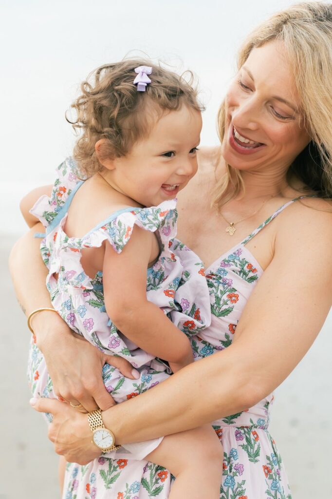 Mom carrying toddler at Hilton Head