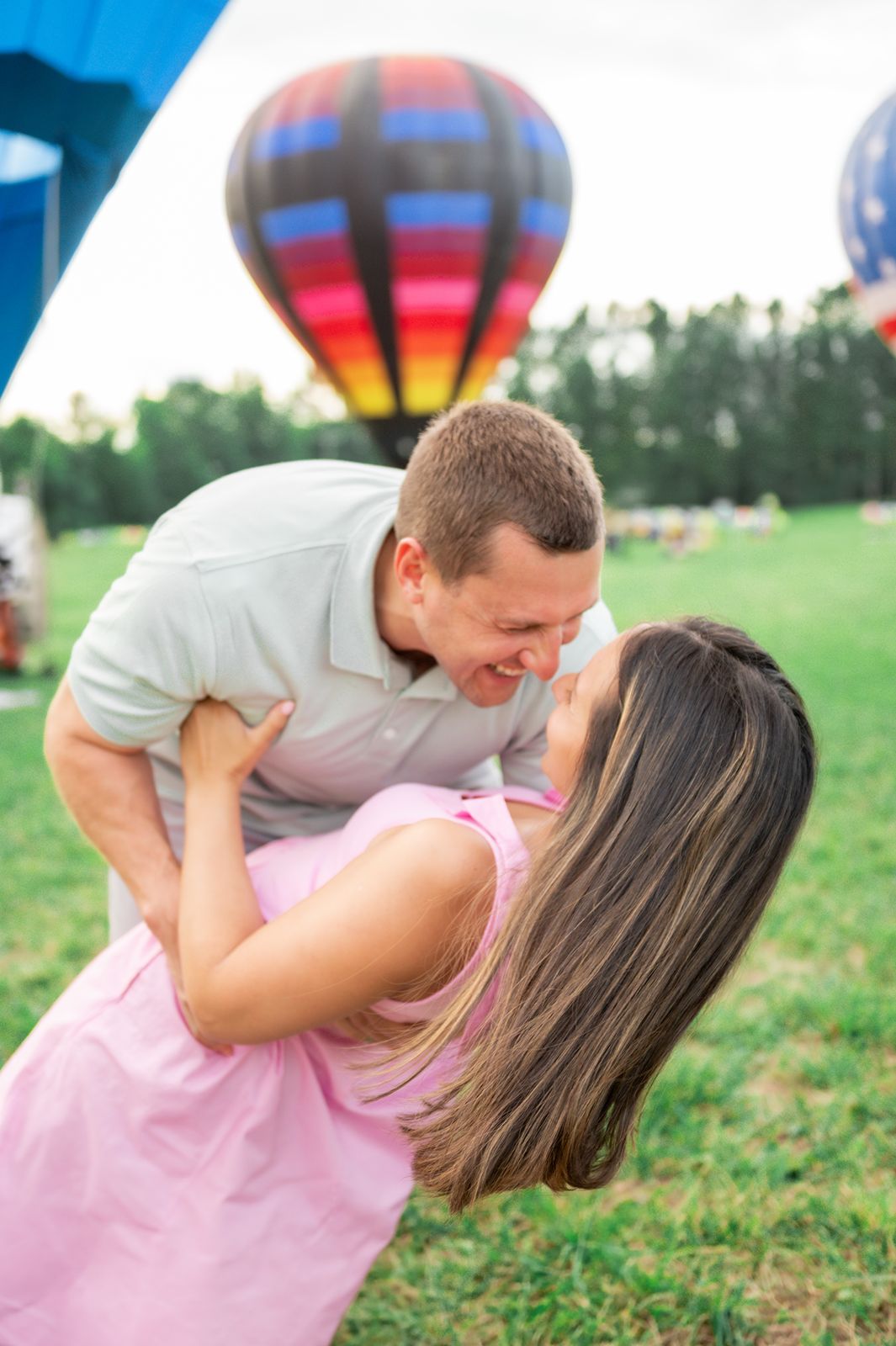 Couple at hot air balloon festival