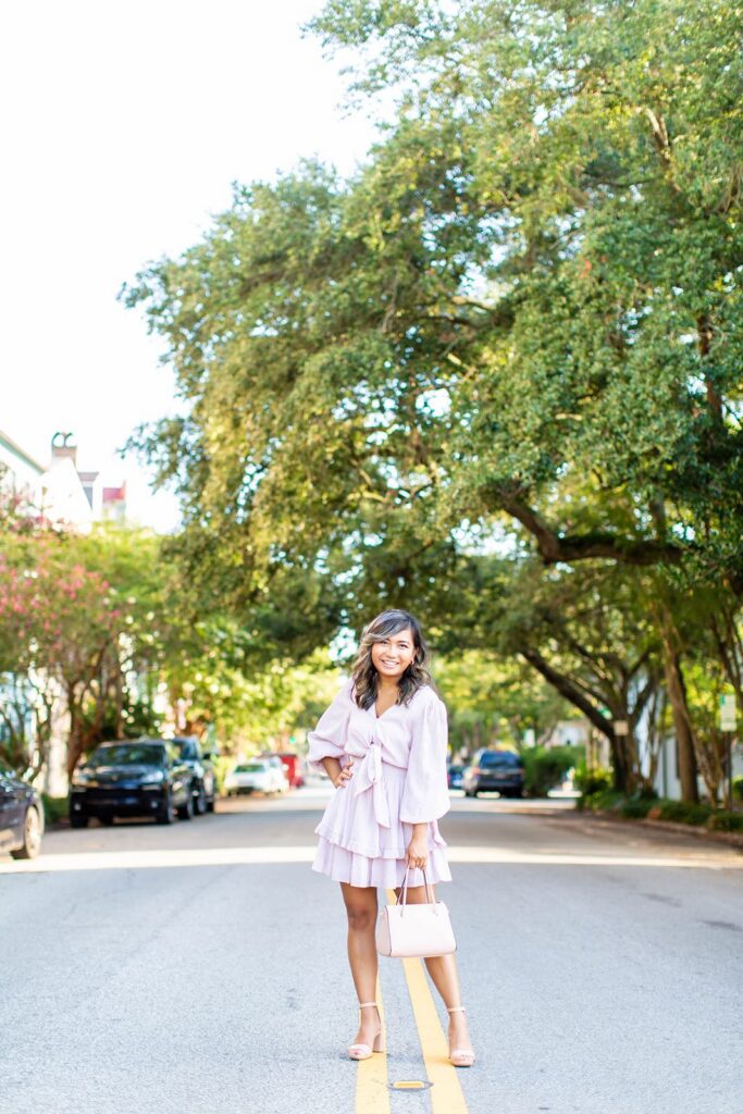 Charleston Engagement photographer Abby Joy Studio standing in the street