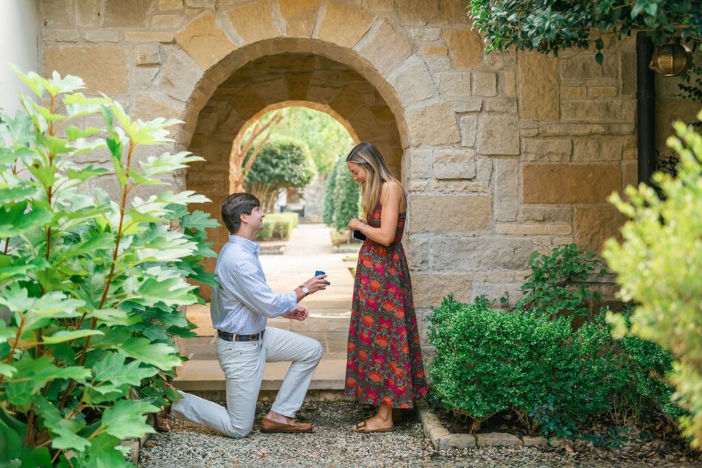 Guy kneeling to propose at The Reserve at Lake Keowee